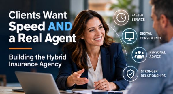Independent insurance agent helping a client while using digital insurance technology on a computer.